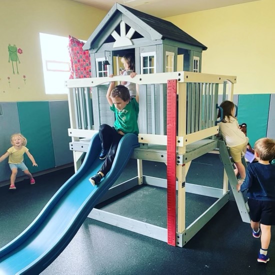 Kids playing on a indoor playground