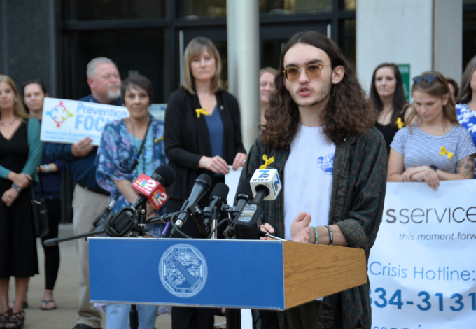 Student speaks from lectern