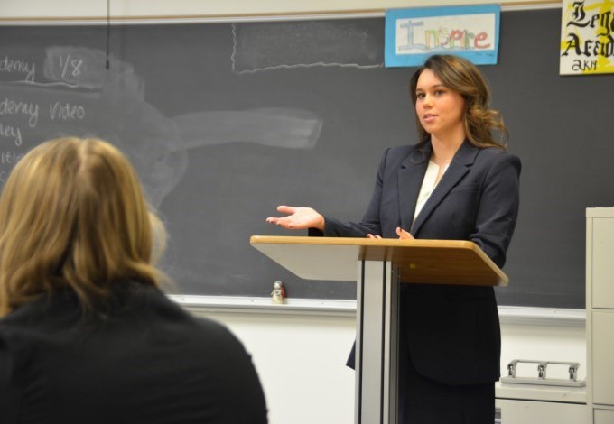 Haley Muehlbauer speaking to the Legal Academy class about her career.