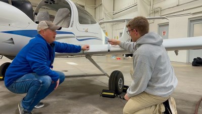 Students with plane